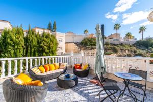 Un balcón o terraza en La Casa de La Felicidad