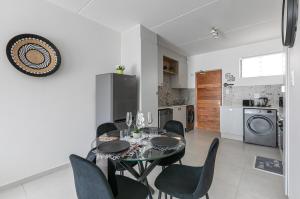 Η κουζίνα ή μικρή κουζίνα στο Bloom at Maroela