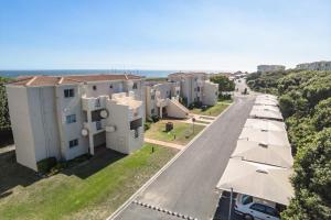 an aerial view of a building and a street at Hermanus Beach Club in Hermanus