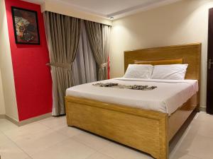 Кровать или кровати в номере The Downtown Hotel Apartments