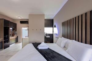 En eller flere senge i et værelse på Modern 4 sleeper, hot tub, BBQ