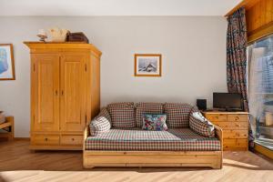 TV a/nebo společenská místnost v ubytování Mont-Fort E4 - 2 pers- au pied des pistes