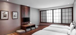 Televisyen dan/atau pusat hiburan di Orange Hotel - Wenhua, Chiayi