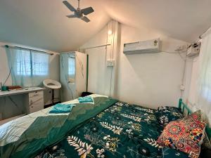 Postel nebo postele na pokoji v ubytování Villa Del Los