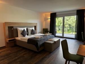 Postel nebo postele na pokoji v ubytování East-Riverside Boardinghouse