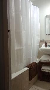 Koupelna v ubytování Tu dpto en Mardel + 9 fotografií