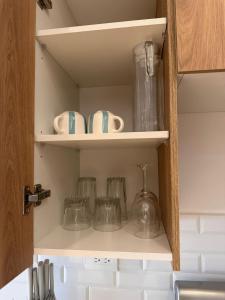 Kuchyň nebo kuchyňský kout v ubytování Modern Apartment in Zone 9