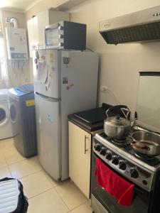 Η κουζίνα ή μικρή κουζίνα στο paseo San Carlos +3 φωτογραφίες