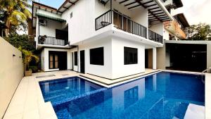 Πισίνα στο ή κοντά στο Blue Heaven Hotel