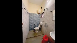 Ένα μπάνιο στο Pandu Ranga Residency Nirvana Beach +19 φωτογραφίες