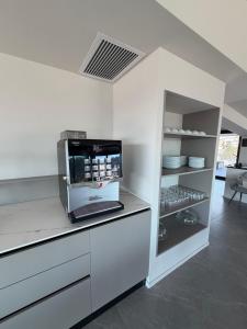 Kuchyň nebo kuchyňský kout v ubytování Lamal Hotel Napoli + 40 fotografií