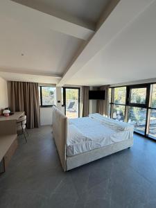 Postel nebo postele na pokoji v ubytování Lamal Hotel Napoli