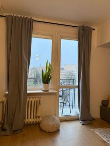 Балкон или терраса в Staromiejskie Retro Apartment by Downtown Apartments