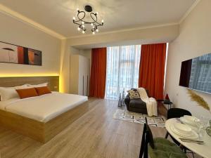 Postel nebo postele na pokoji v ubytování SarIn studio Self check-in Swimming pool + 15 fotografií