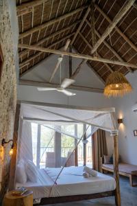 Postel nebo postele na pokoji v ubytování Natural Park Villa Resort + 40 fotografií