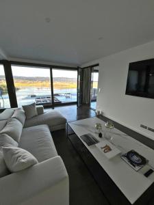 Posezení v ubytování Le Nordic 4 pers - vue imprenable sur un lac dans le Haut-Jura