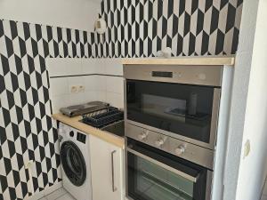 Η κουζίνα ή μικρή κουζίνα στο Appartement lumineux avec terrasse et parking à 5 min du centre ville