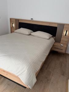 Ένα ή περισσότερα κρεβάτια σε δωμάτιο στο Apartament DAR25