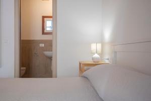 En eller flere senge i et værelse på Residenza La Chiusa 1984 by ElbaSummer