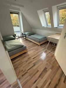 En eller flere senge i et værelse på City Hideaway Braunschweig