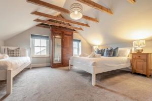 Ένα ή περισσότερα κρεβάτια σε δωμάτιο στο 4 Bed in St. Brides oc-h30490