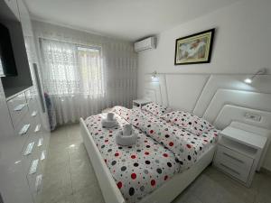 Ένα ή περισσότερα κρεβάτια σε δωμάτιο στο Romance Apartment