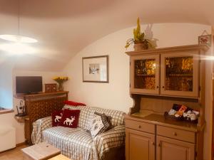 Una televisión o centro de entretenimiento en Casetta CuCù