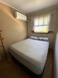 Postel nebo postele na pokoji v ubytování Igrejinha Rio Grande do Sul Brasil
