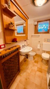 Un baño de Casetta CuCù 14 fotos más