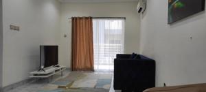 TV a/nebo společenská místnost v ubytování Beautiful 4 bedroom by the water