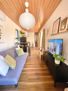 TV a/nebo společenská místnost v ubytování Moka - Holiday Home by the Sea