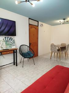 TV a/nebo společenská místnost v ubytování Departamento en Coquimbo centro hospital