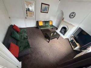 Μια τηλεόραση ή/και κέντρο ψυχαγωγίας στο Cosy 3 Bedroom in Birmingham