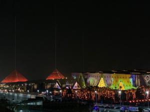 a city lit up at night with christmas lights at Gabry Pyramids And Grand Egyptian Museum View Hotel in Cairo +16 photos