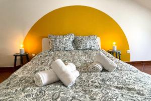 Ένα ή περισσότερα κρεβάτια σε δωμάτιο στο CASA MALUCA by Stay in Alentejo