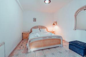 Ένα ή περισσότερα κρεβάτια σε δωμάτιο στο Family Guesthouse Dar Al Hajja Fatima +4 φωτογραφίες