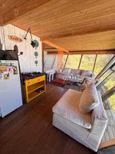 Ένα ή περισσότερα κρεβάτια σε δωμάτιο στο Cabaña Calma