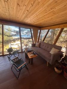 Χώρος καθιστικού στο Cabaña Calma +3 φωτογραφίες