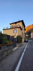 a house on the side of a road at Casa Lago Como in Perledo +65 photos