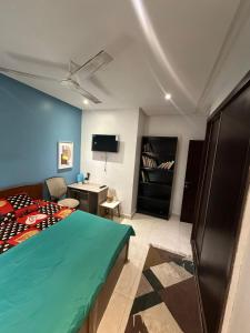 Ένα ή περισσότερα κρεβάτια σε δωμάτιο στο The Sonu Garden