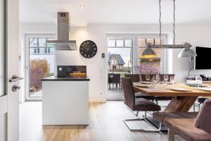 Η κουζίνα ή μικρή κουζίνα στο Ferienhaus Treibholz