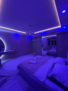 Ένα ή περισσότερα κρεβάτια σε δωμάτιο στο Cozy apartment in the Heart of Bukhara