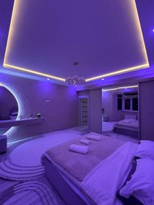 Ένα ή περισσότερα κρεβάτια σε δωμάτιο στο Cozy apartment in the Heart of Bukhara