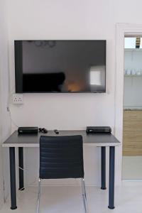 TV/trung tâm giải trí tại Nirvana Cottage Houtbay +5 ảnh