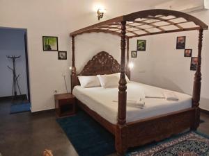 Giường trong phòng chung tại Seashore Beach Resort Varkala