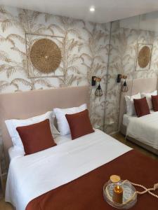 Postel nebo postele na pokoji v ubytování Camarote Beach