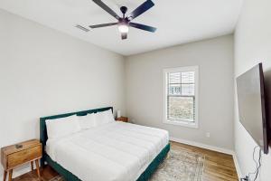 Ένα ή περισσότερα κρεβάτια σε δωμάτιο στο Vieux Carre