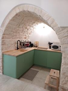 Η κουζίνα ή μικρή κουζίνα στο Al Murigini - Casa Vacanze