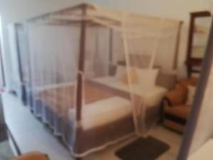 New Hotel Bundala park في تيساماهاراما: نموذج لغرفة نوم بها سرير متأرجح