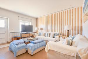 TV a/nebo společenská místnost v ubytování Beach House Baleal